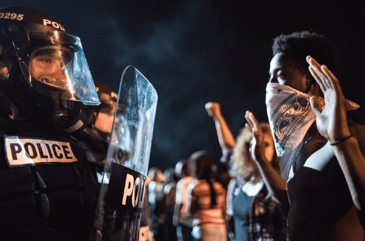 Police Officers Face-Off with Protestors activism protest