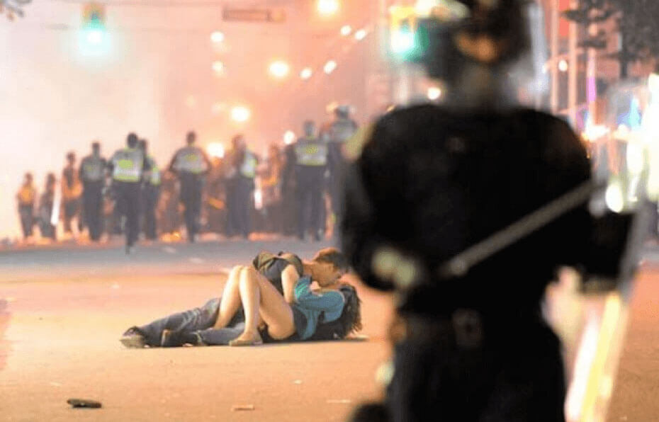 vancouver riot tender kiss political photos