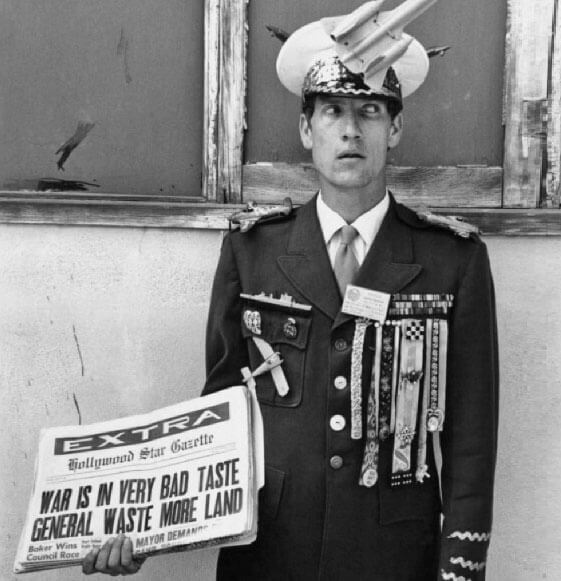 war is in very bad taste protest sign